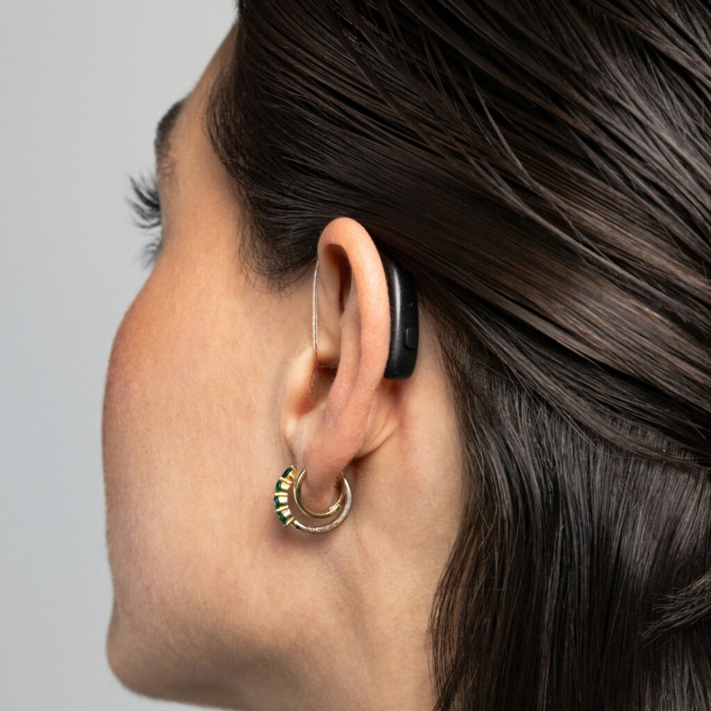 bte hearing aid closeup woman